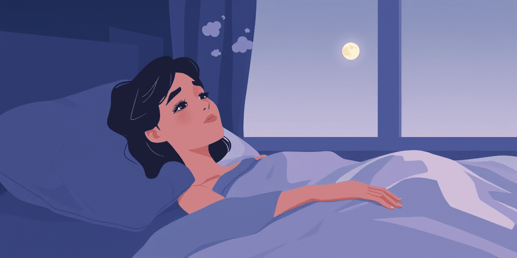 A woman lying awake in bed at night unable to sleep, illustrating the connection between sleep disorders and anxiety