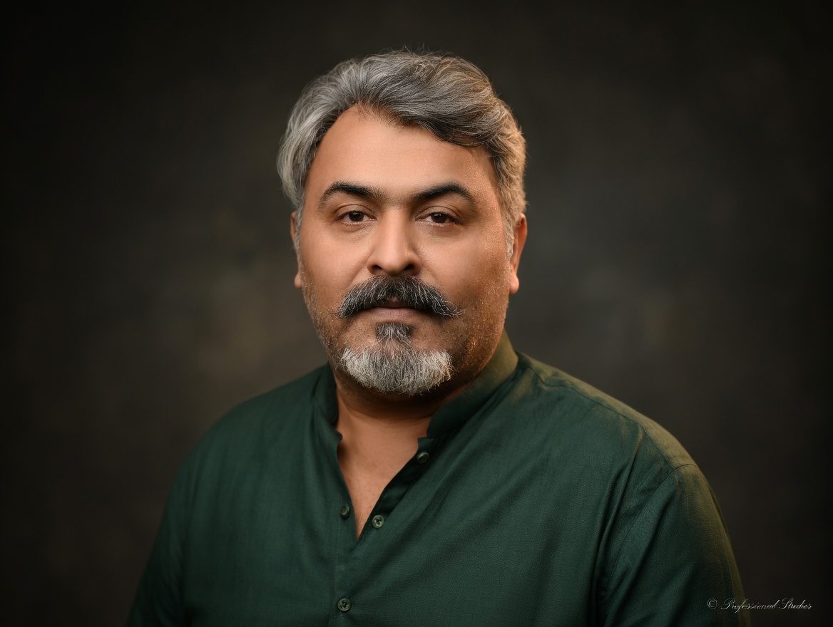 Ashab writing at his desk — founder of Mindbloom